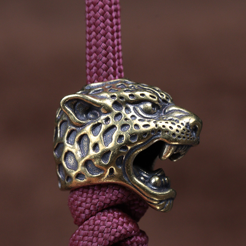 Scultura testa di leopardo col - Paracord Survival Bracelet recensione e prezzo